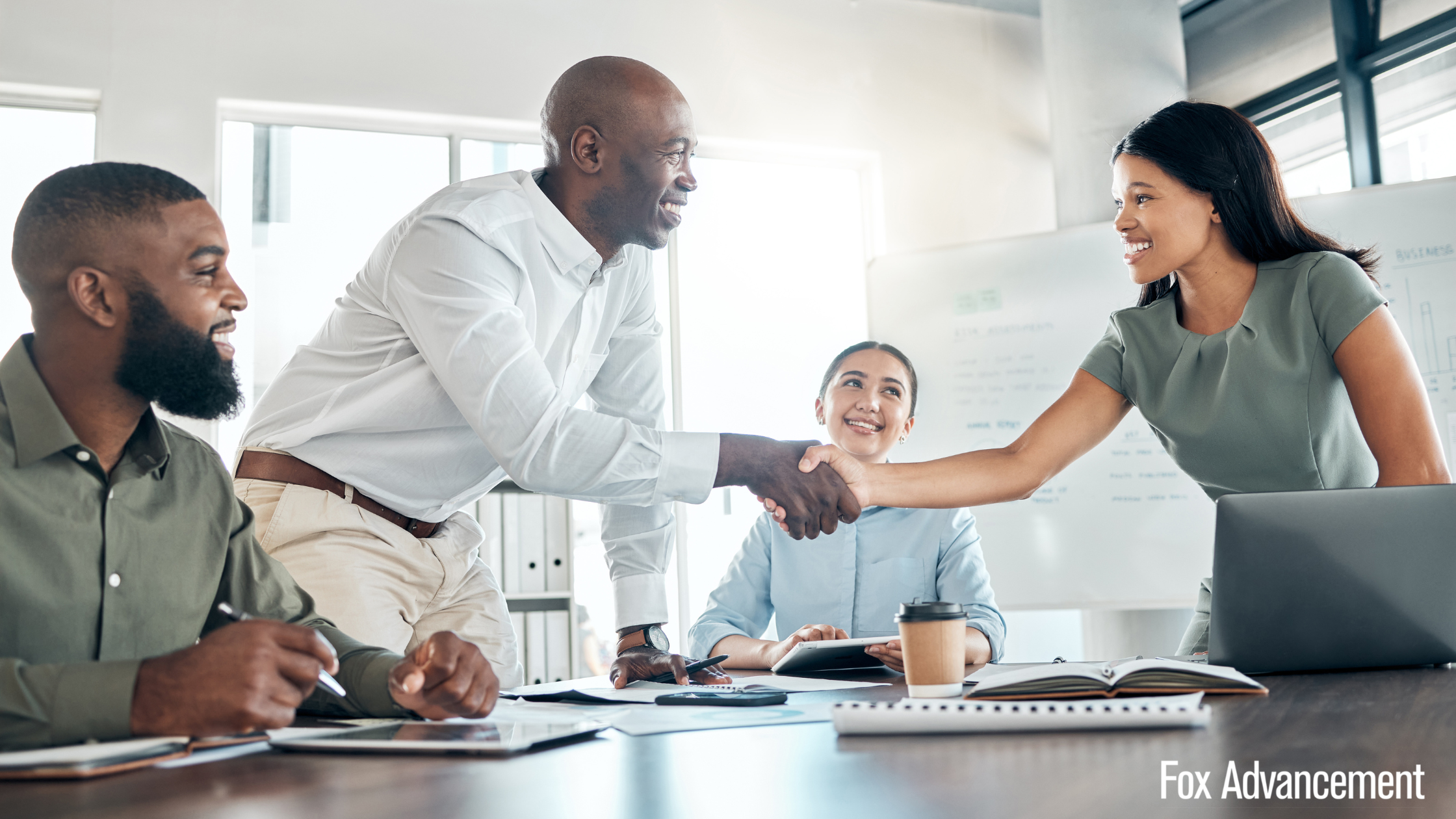 Two professionals shaking hands